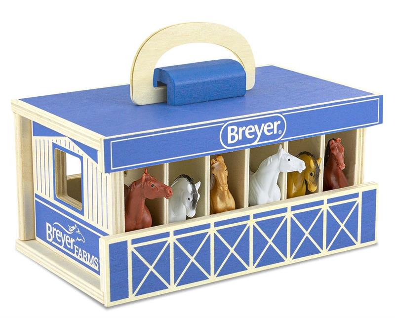 Play and go! This high quality wood stable comes complete with 6 Stablemates horses. Designed to be easy for small hands to carry, the wooden carry case makes the perfect take-along toy!  Stablemates | 1:32 Scale | Ages 4+