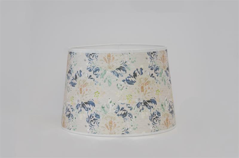This damask inspired floral print features a variety of colors in elegant unity. Navy or Indigo blue and seafoam green petals pop on the ivory background tones, with subtle hints of lime green, white, and peach. 12" base diameter, this style of Parchment 