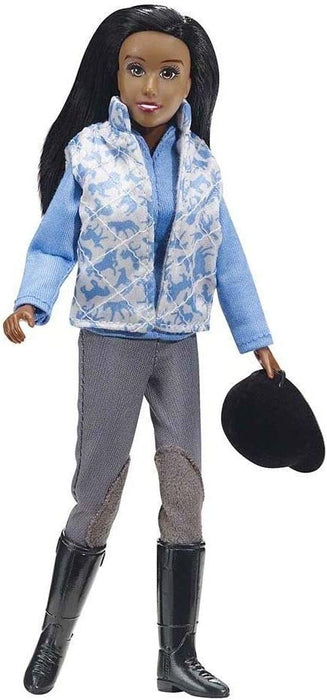 Makayla is ready to get to work schooling horses! She's attired in breeches, shirt, fleece-lined satin vest, tall boots and a helmet! Fully-articulated 8" figure.