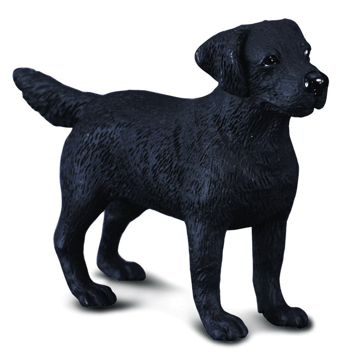toy figurine of a black lab dog