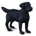 toy figurine of a black lab dog