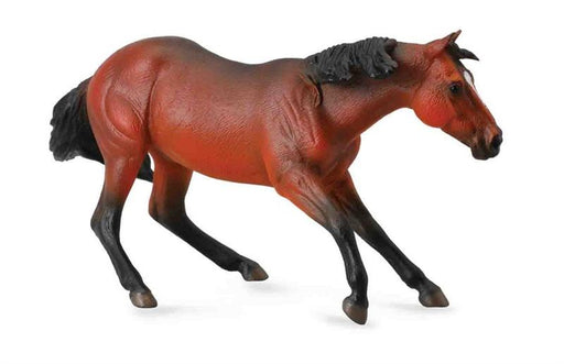 plastic toy horse in cutting pose, brown toy figurine horse