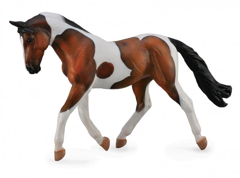 Trotting bay tobiano paint or pinto horse, toy figure