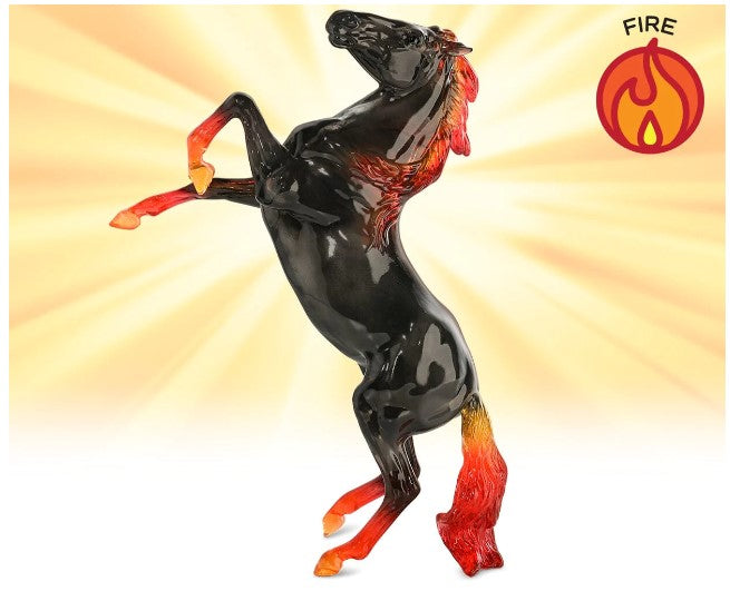 Brandell is a powerful rearing Mustang who embodies the beautiful and eye-catching properties of a fire and the uniqueness of a fire-type horse.  He is reminiscent of burning charcoals with his shimmery smokey black coat and fiery accents.