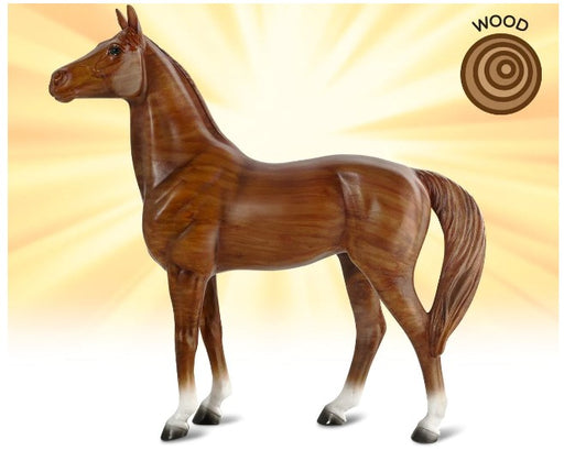 Teak is a poised Thoroughbred who captures the self-confident and competitive image of  a wood-type horse. She proudly showcases her woodgrain patterning that represents the natural layering of wood.