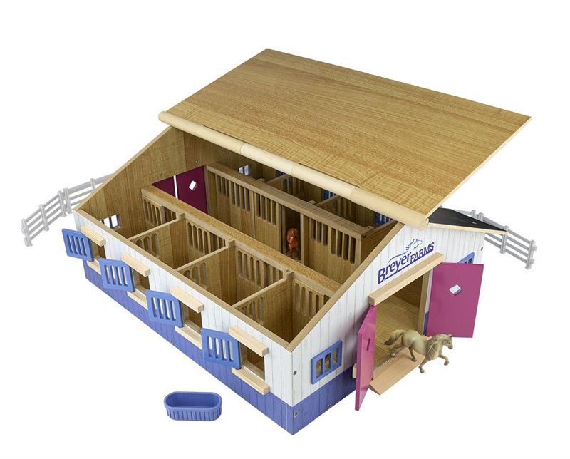 Breyer Farms Deluxe Wood Stable comes complete wWith unique lift-able roof panels, working doors and windows, and 7 stalls, the Breyer Farms Stable allows for engaging play from every angle. Whether youre dreaming of a lesson stable or a backyard barn, t