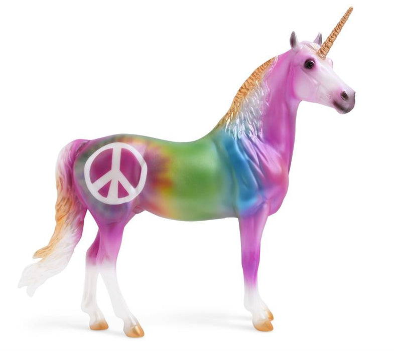 Keep the Peace is decorated in a rainbow of colors that appear to be tie dyed, complimented by golden accents. He features a large peace sign on his right hip.
